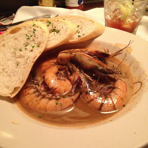 Fresh shrimp in a bowl with toast.
