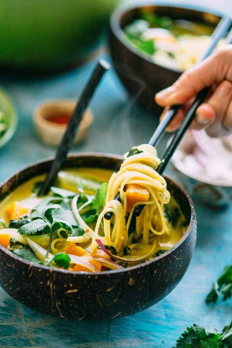 This Butternut Squash + Spinach Coconut Curry Noodle Soup is an easy, warm and flavorful soup recipe that's naturally vegan and gluten free! #vegan #gf #glutenfree #rice #noodles #easy #soup #recipe #coconut #curry #spinach | ColeyCooks.com