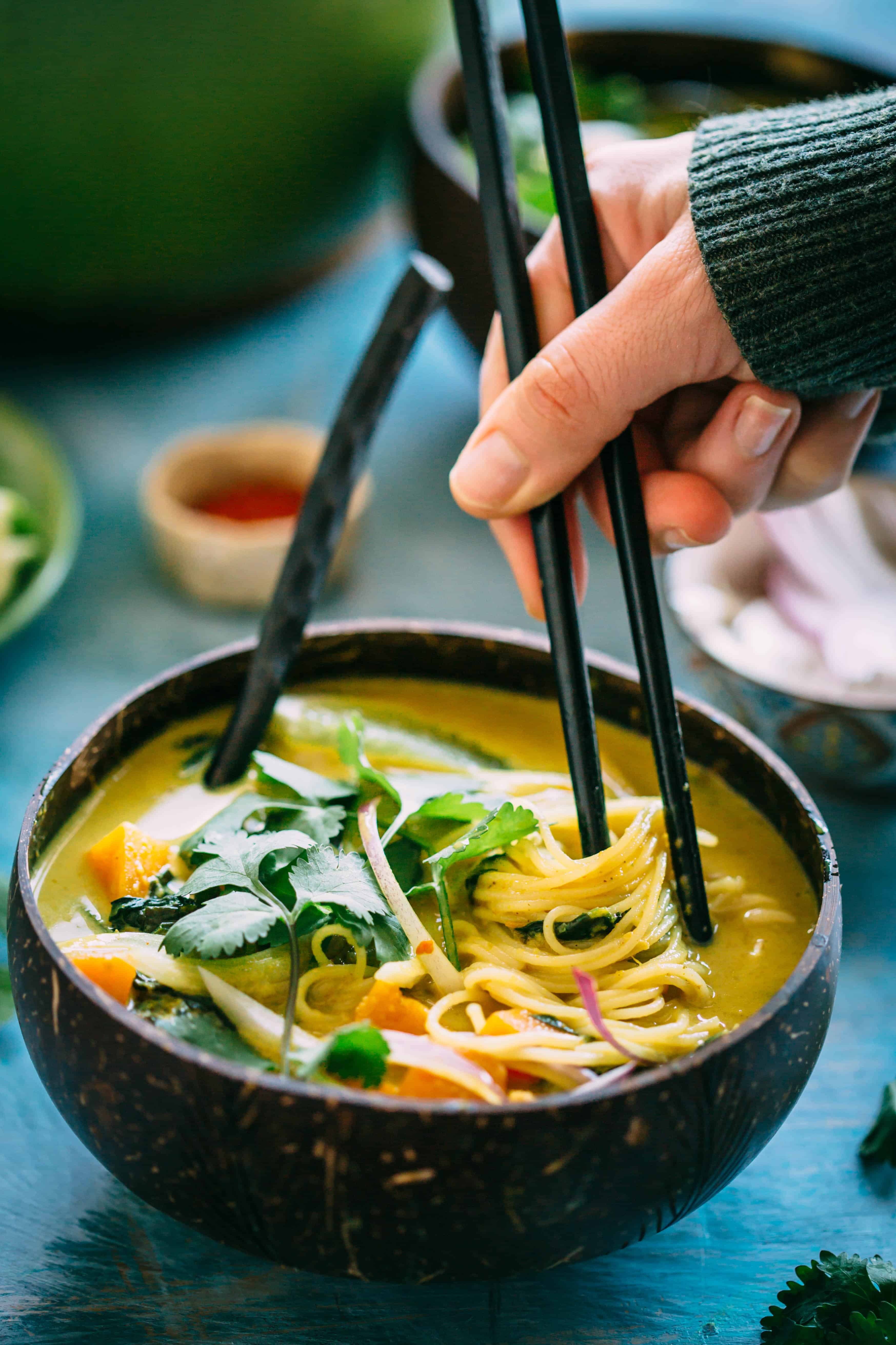 This Butternut Squash + Spinach Coconut Curry Noodle Soup is an easy, warm and flavorful soup recipe that's naturally vegan and gluten free! #vegan #gf #glutenfree #rice #noodles #easy #soup #recipe #coconut #curry #spinach | ColeyCooks.com
