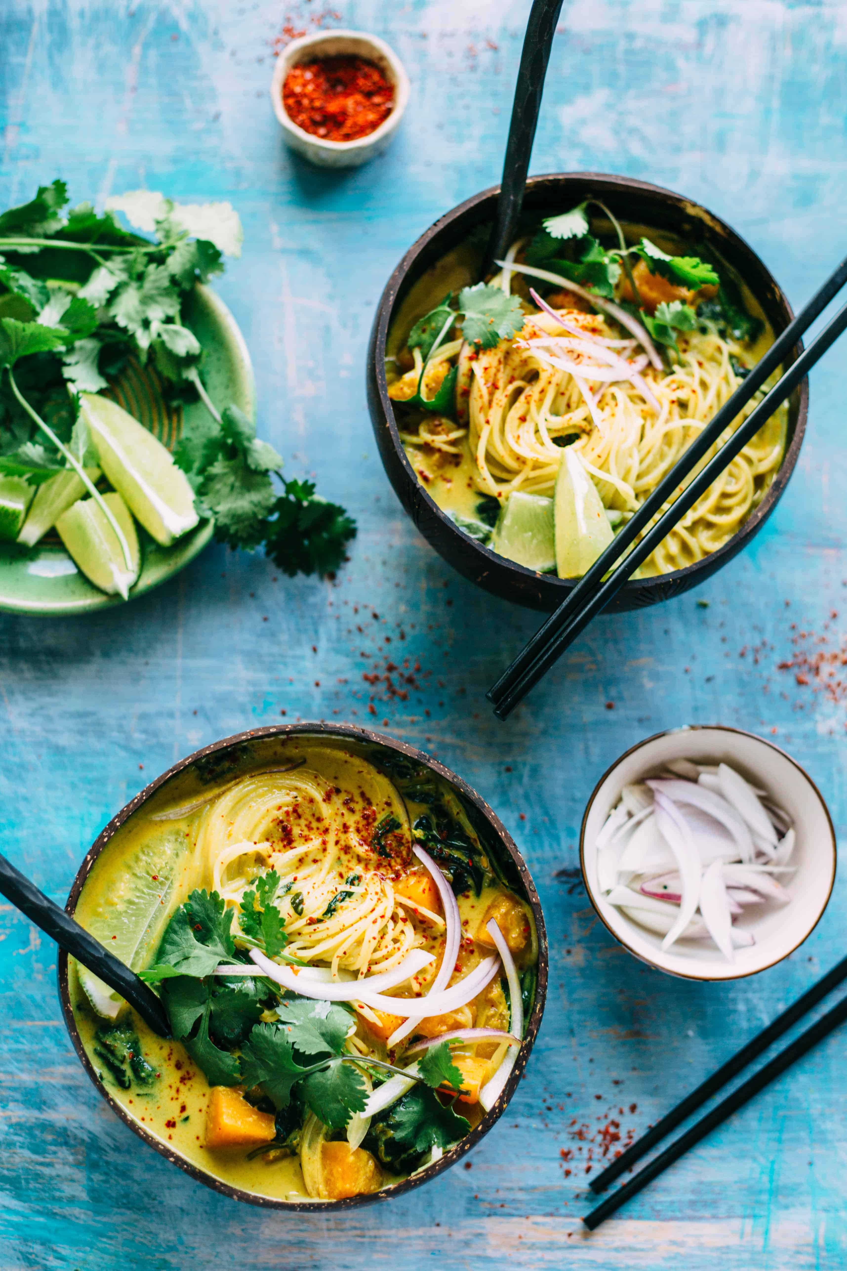 This Butternut Squash + Spinach Coconut Curry Noodle Soup is an easy, warm and flavorful soup recipe that's naturally vegan and gluten free! #vegan #gf #glutenfree #rice #noodles #easy #soup #recipe #coconut #curry #spinach | ColeyCooks.com