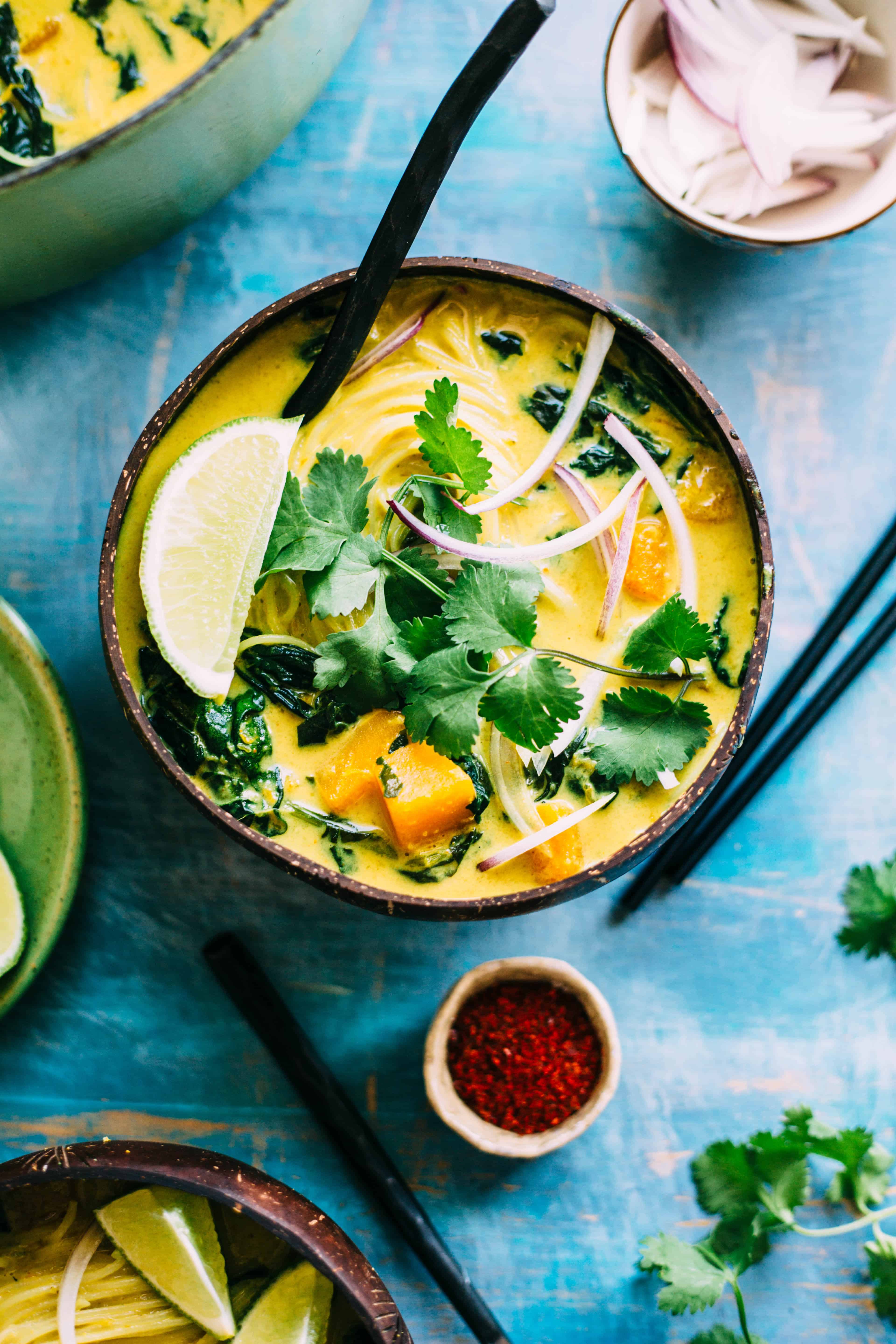 This Butternut Squash + Spinach Coconut Curry Noodle Soup is an easy, warm and flavorful soup recipe that's naturally vegan and gluten free! #vegan #gf #glutenfree #rice #noodles #easy #soup #recipe #coconut #curry #spinach | ColeyCooks.com
