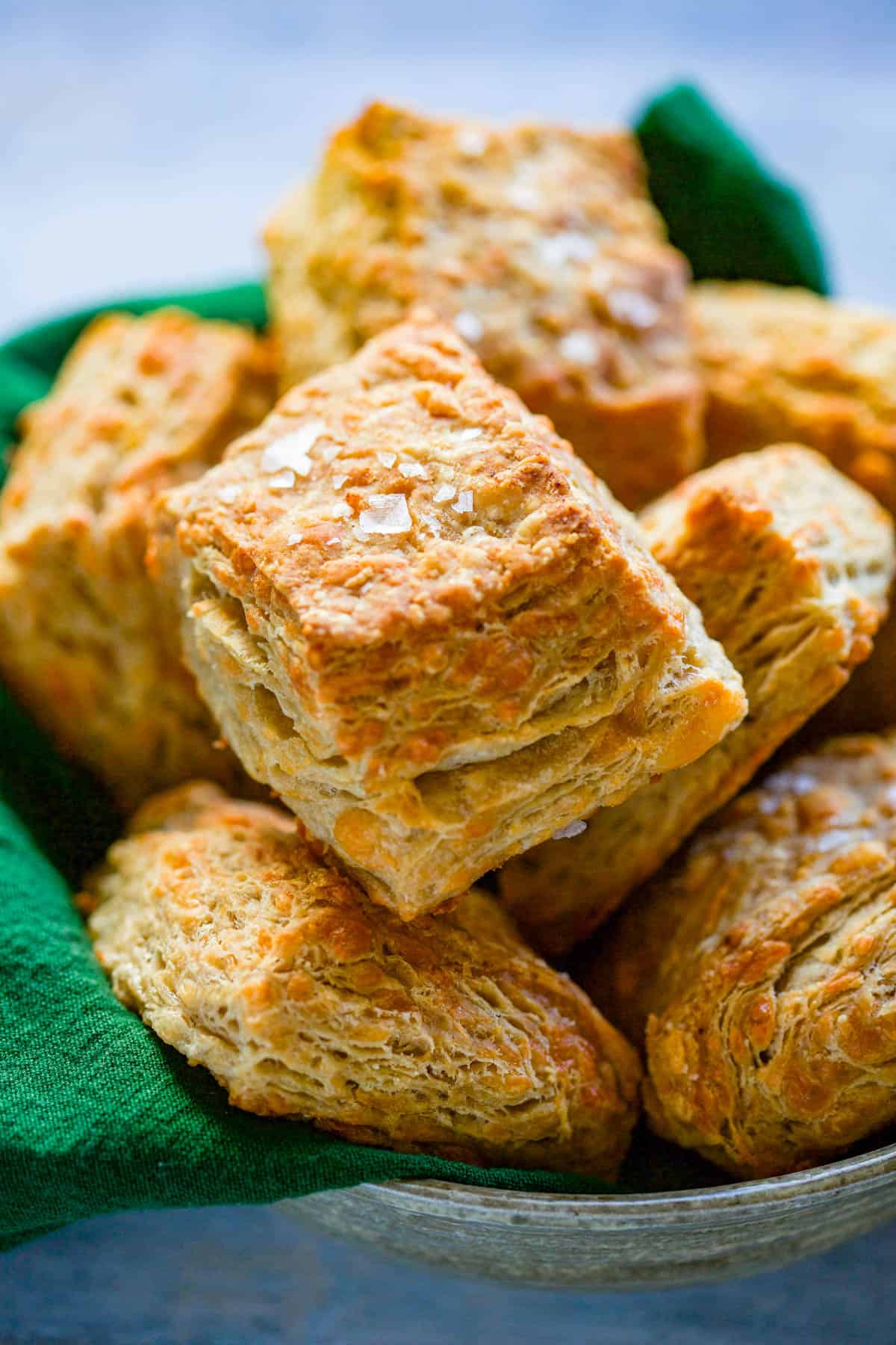 basket of biscuits with green napkin