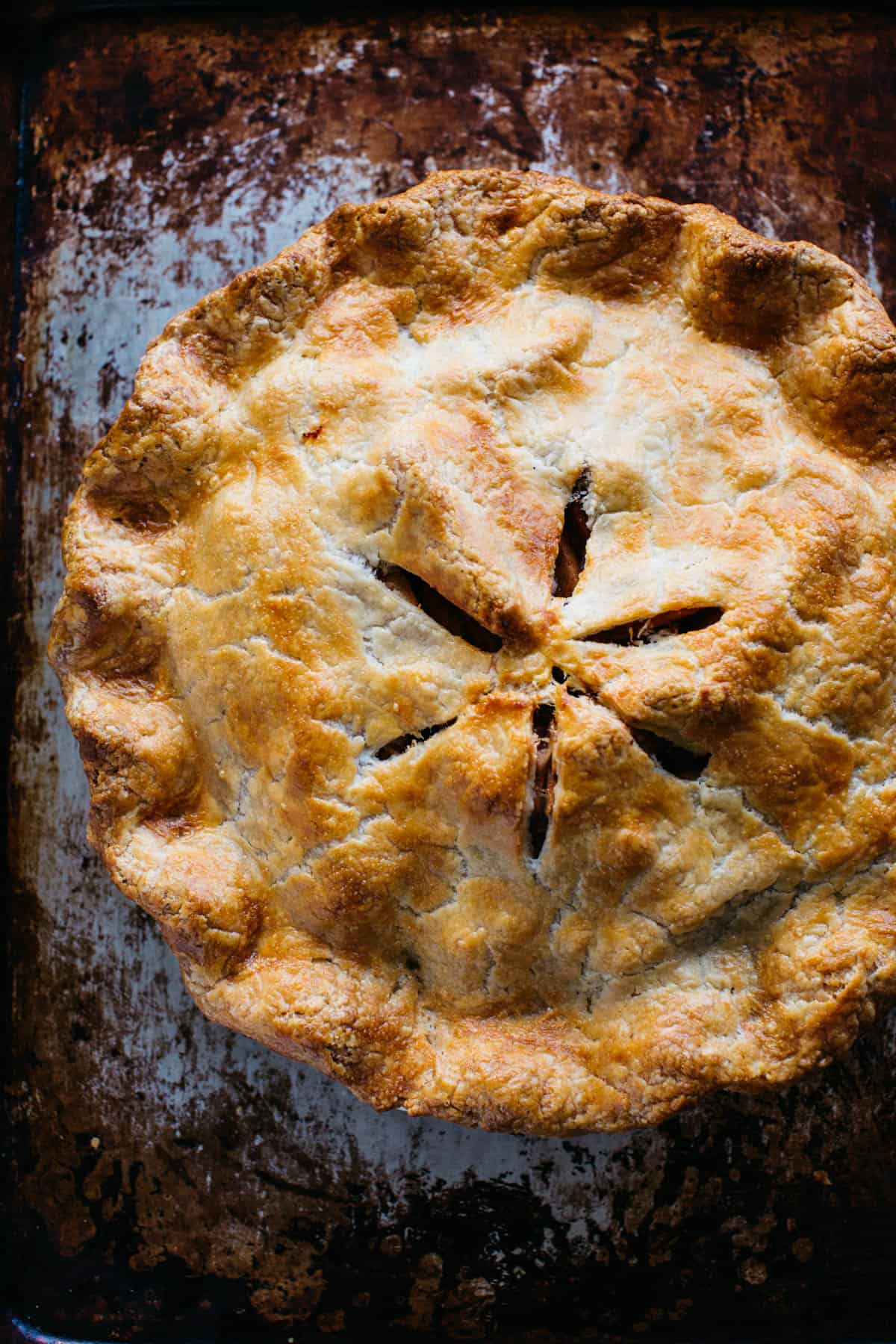 freshly baked pie on a baking sheet