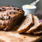 a loaf of cinnamon raisin walnut bread sliced