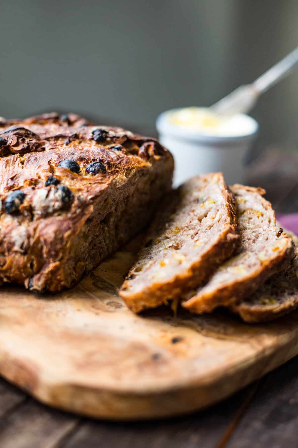 a loaf of cinnamon raisin walnut bread sliced