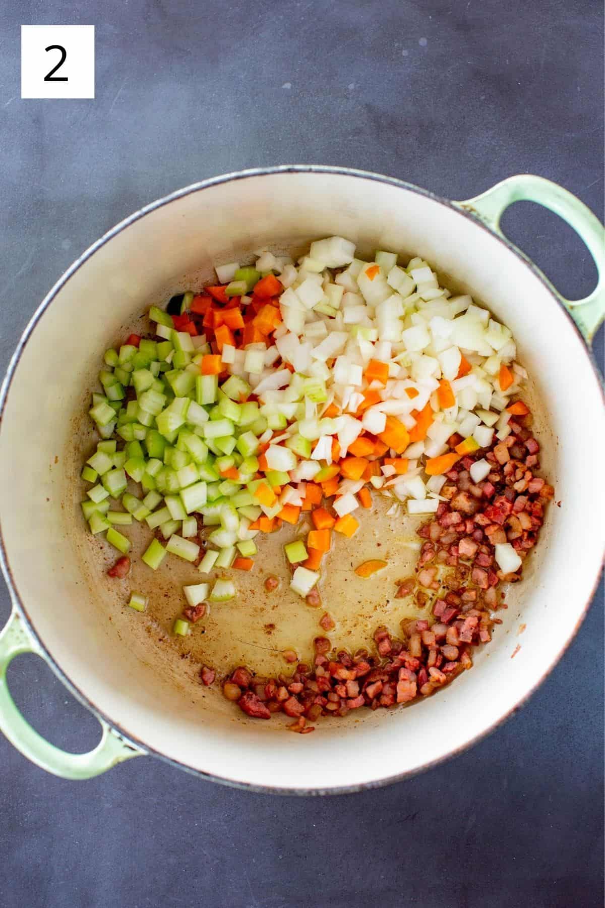 rendered pancetta and carrots, celery and onion in a dutch oven