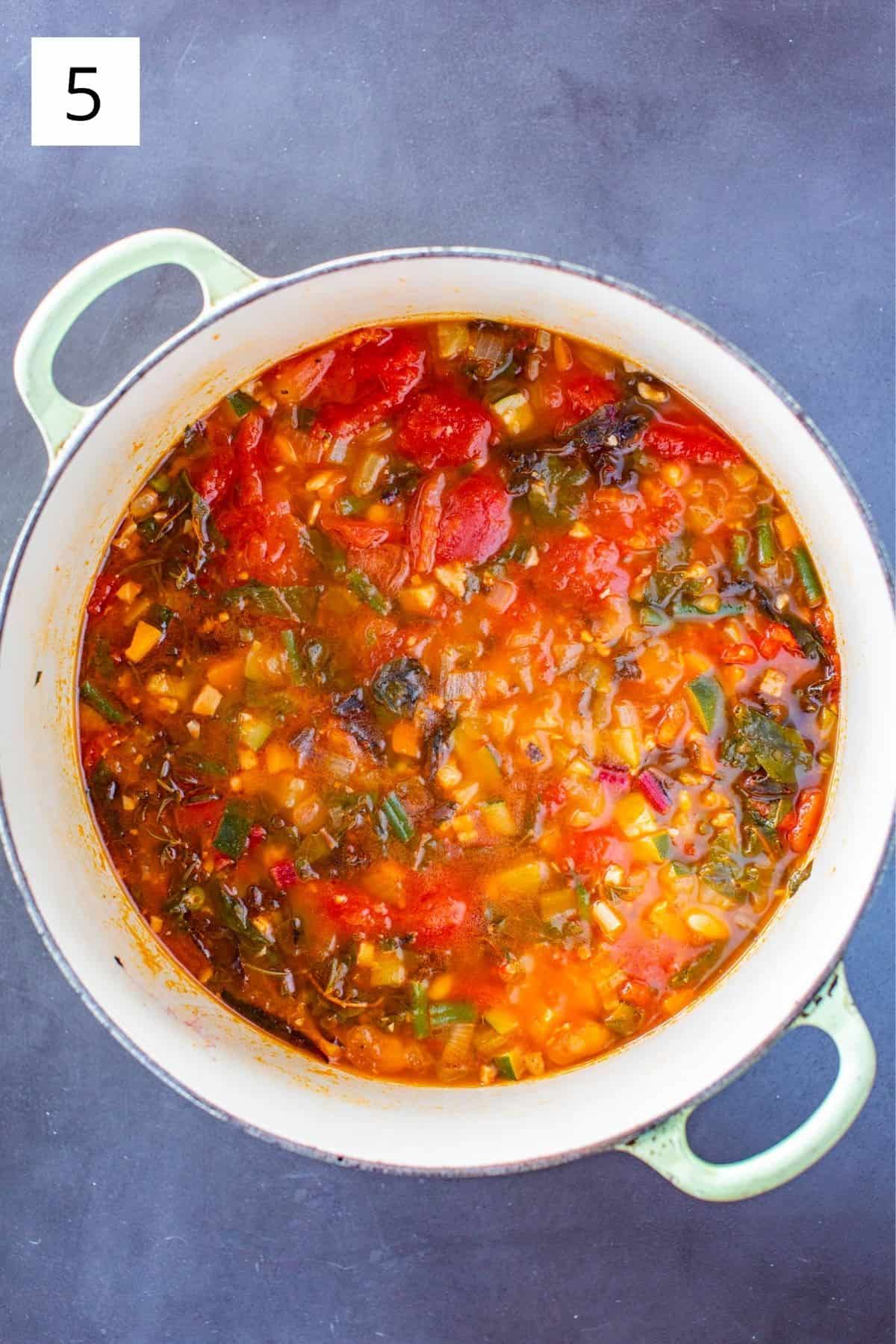 fully cooked minestrone in a dutch oven