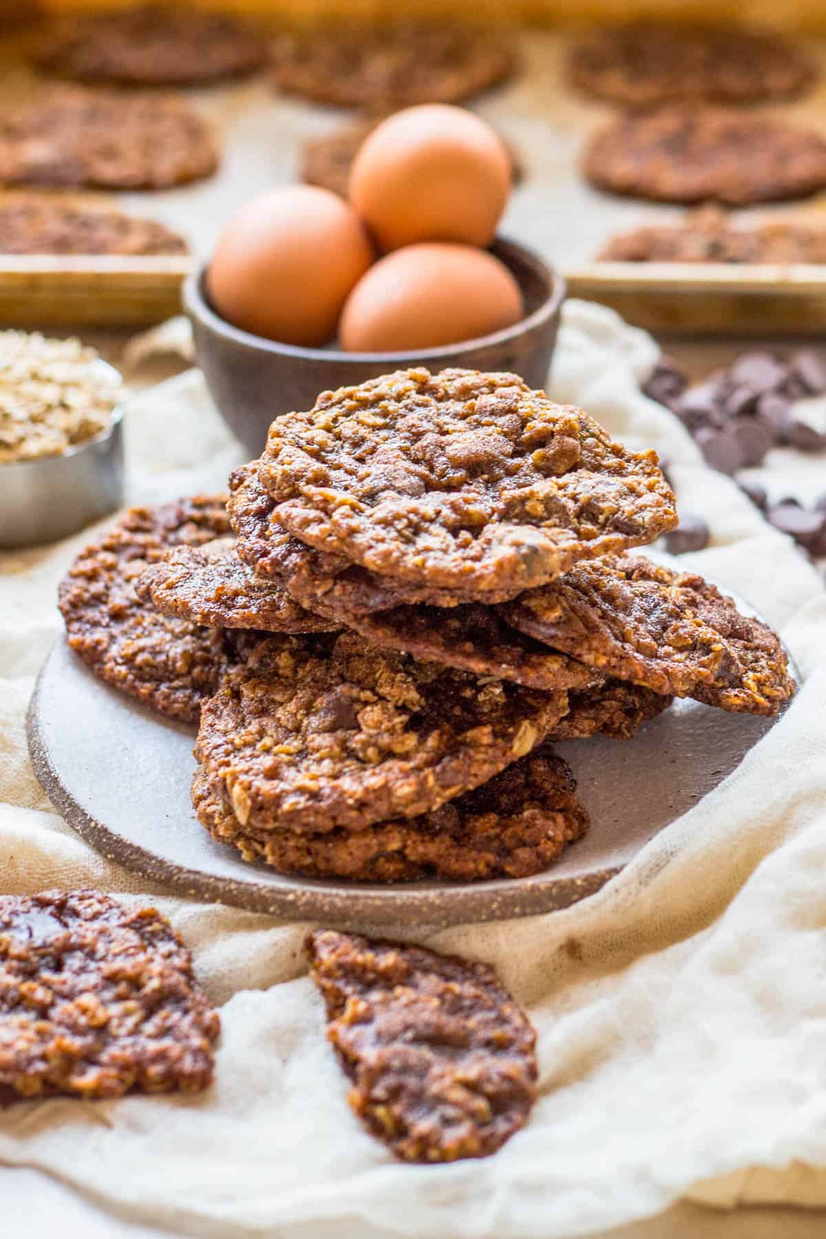 side view of a plate of cookies with ingredients in the background