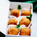 close up of a box of candies with shamrocks