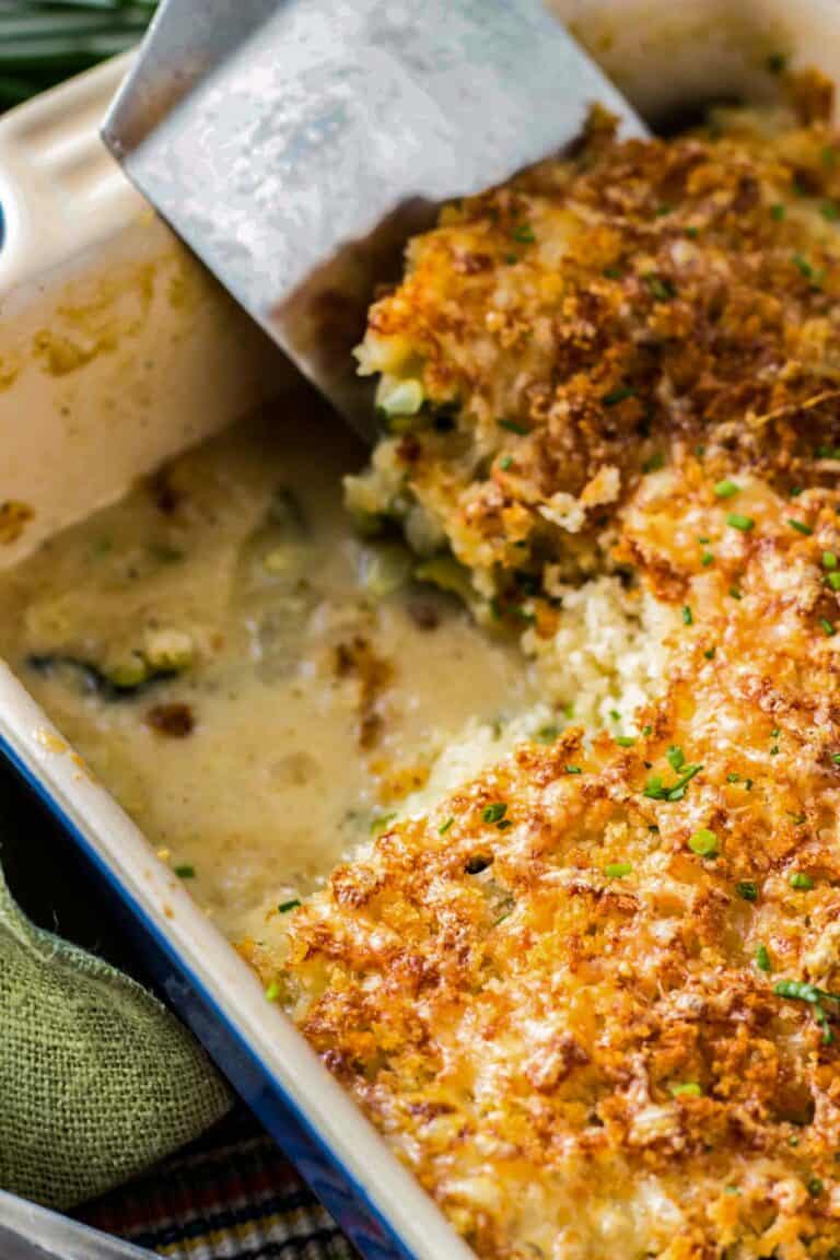 Close up of a square removed from the corner of a gratin in a baking dish.
