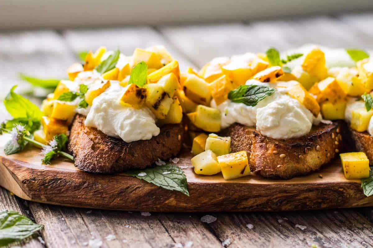 side view of grilled zucchini bruschetta