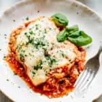 Lighter eggplant parmesan in a pasta bowl.