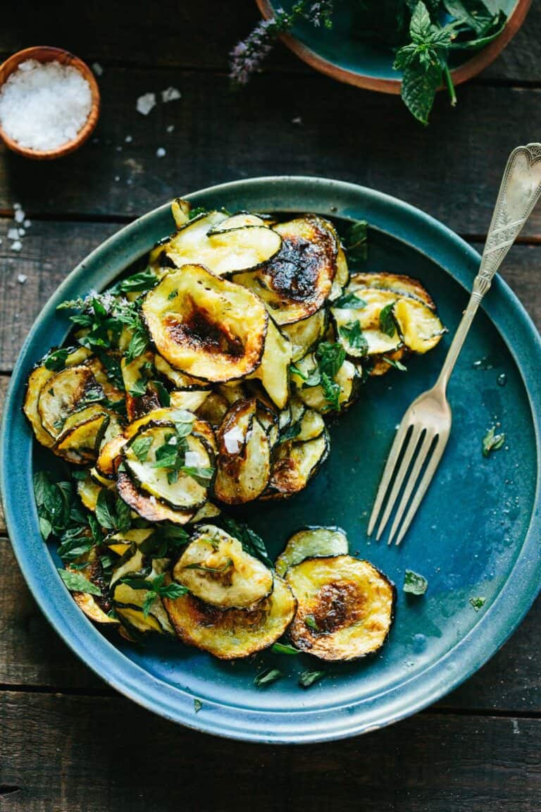 Zucchini alla Scapece served on a blue plate