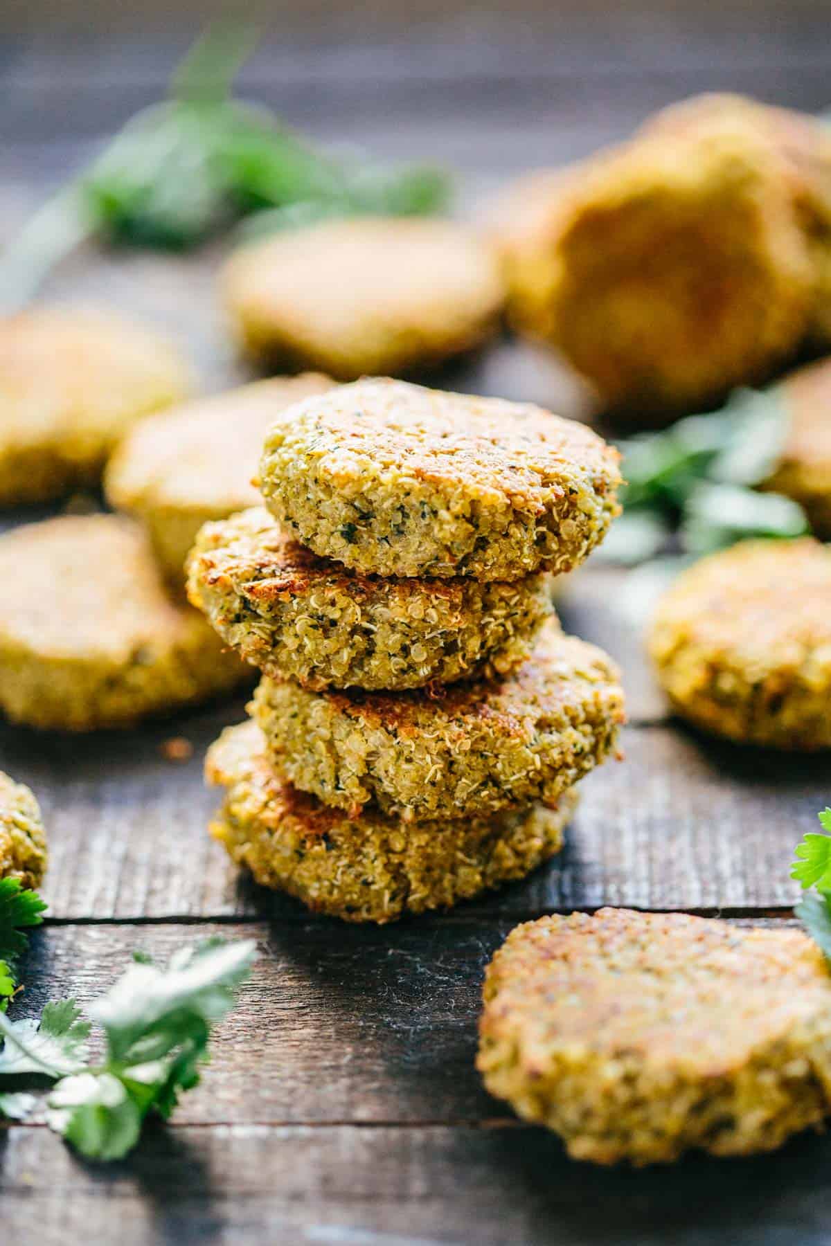 A stack of baked falafel patties on a table.