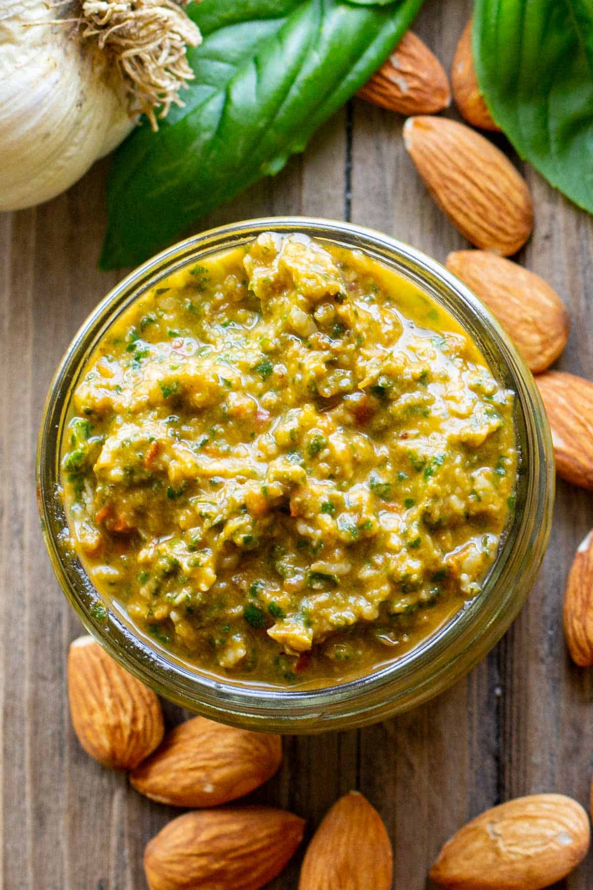 Close up overhead shot of a jar of pesto.