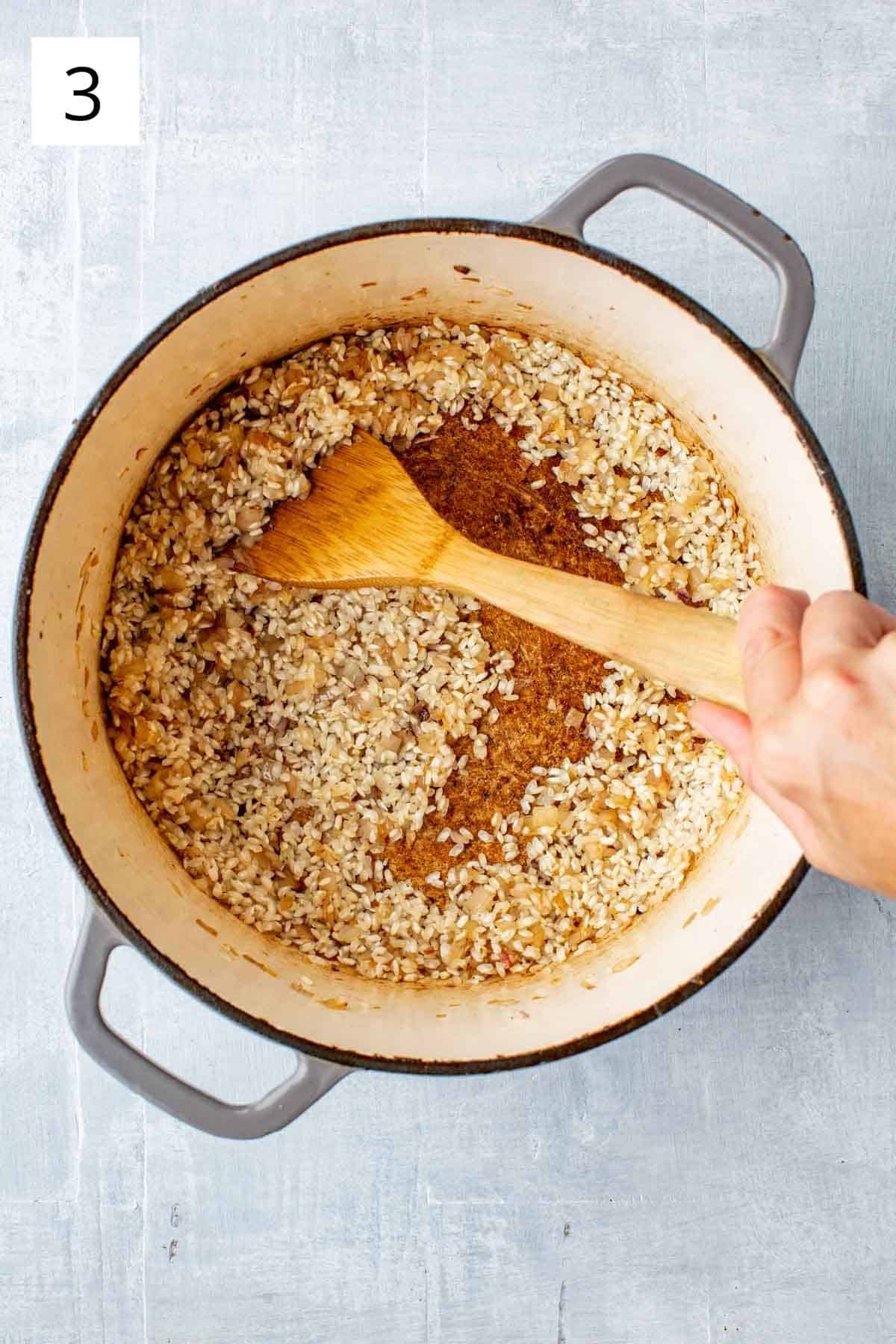 Toasting Arborio rice to create a delicious risotto. 