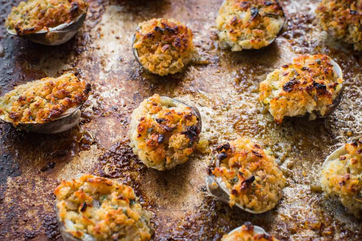 Close up shot of golden baked clams oreganata.