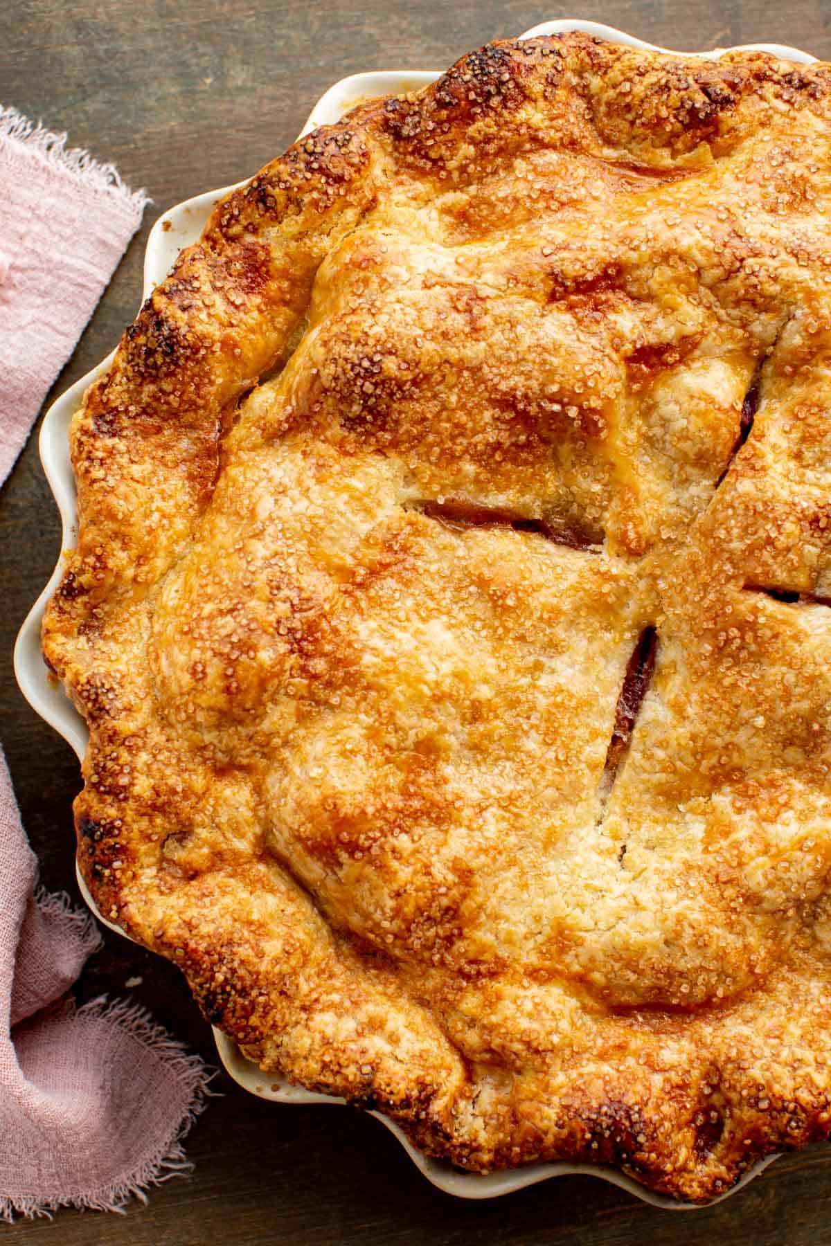 Close up of a golden brown pie made with a Crisco pie crust recipe.