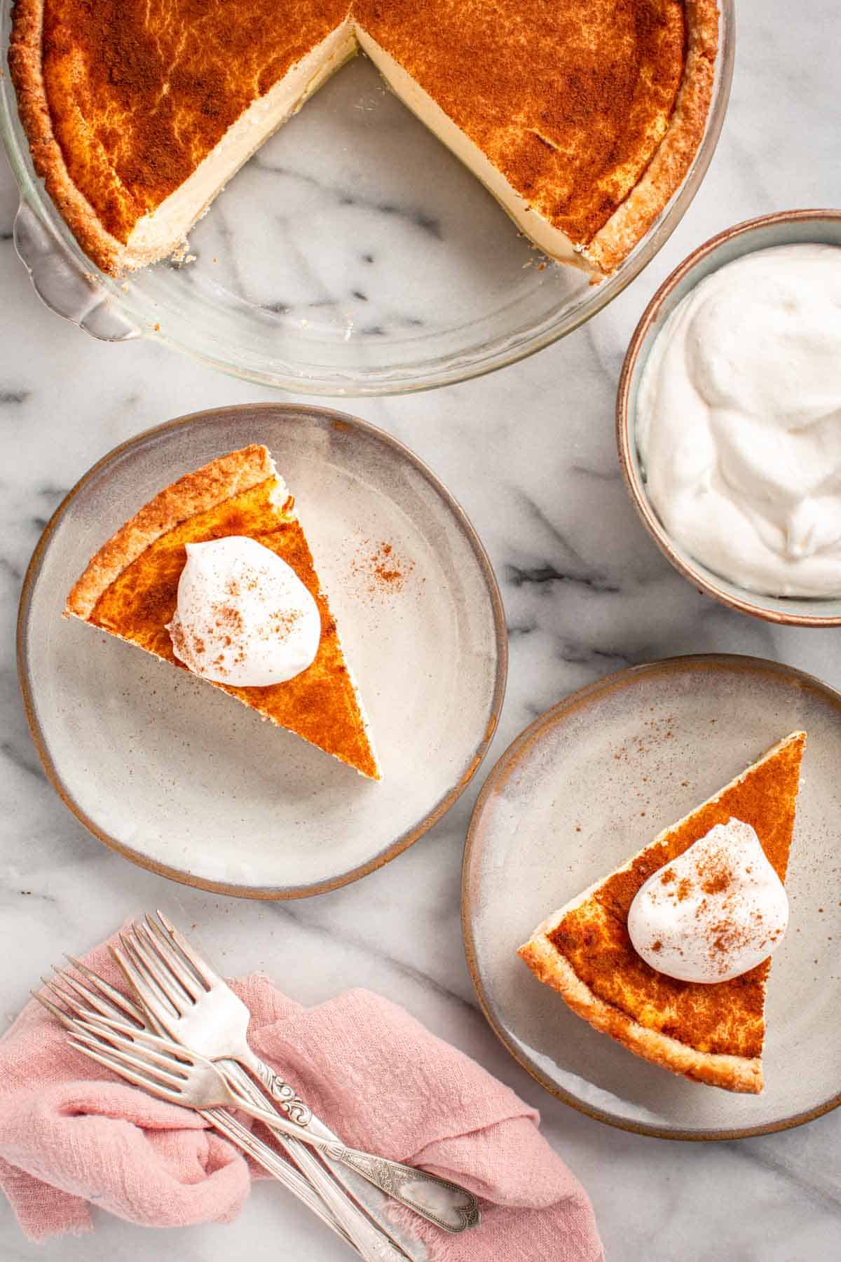 Golden slices of Italian ricotta pie served on small plates.