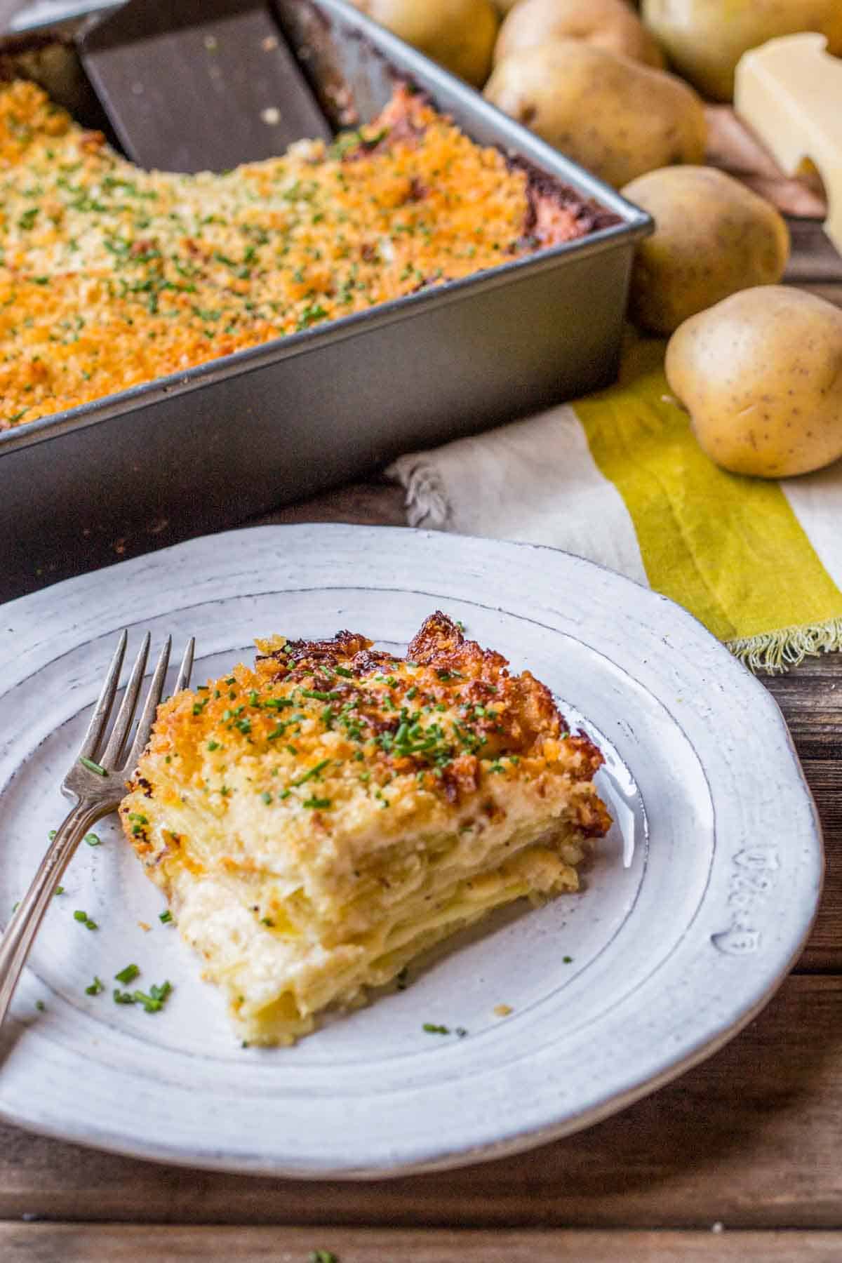 A piece of Dauphinoise potatoes on a plate.