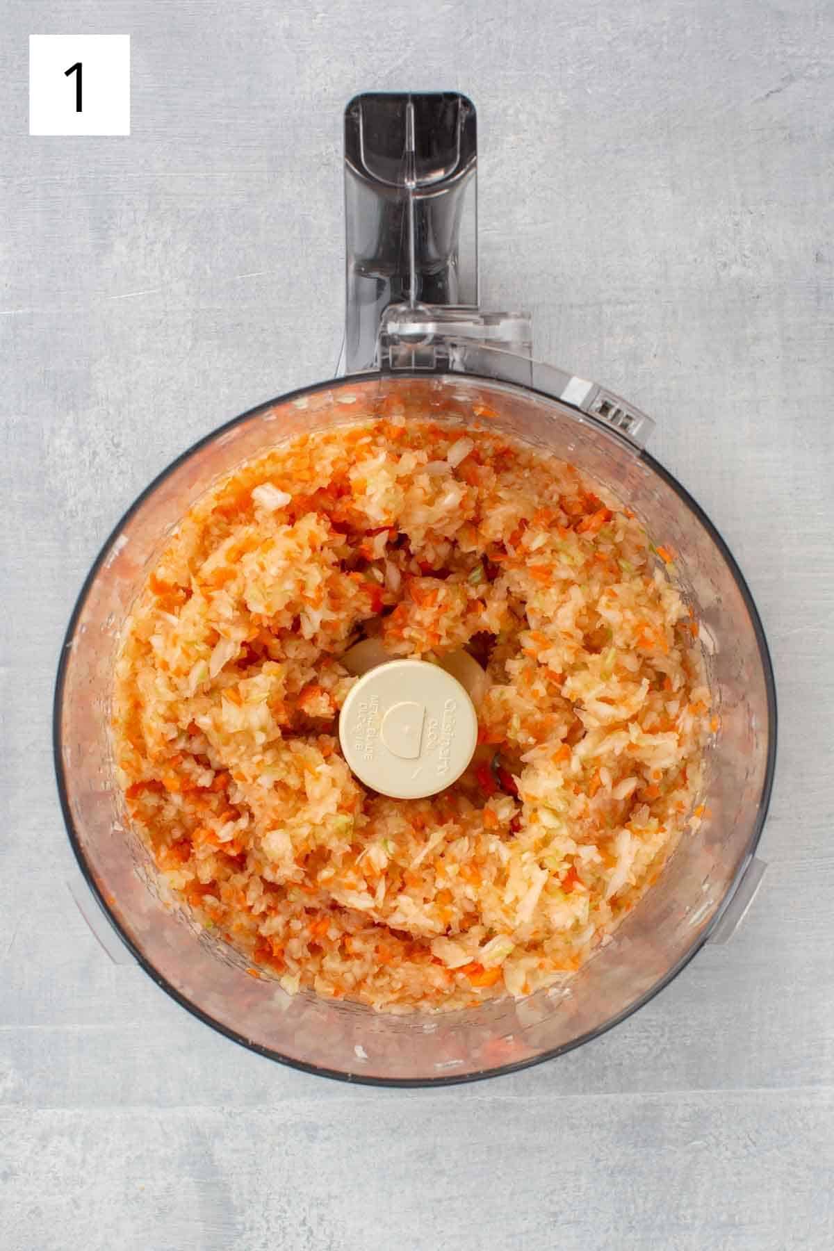 Pasta fazool ingredients in a food processor.