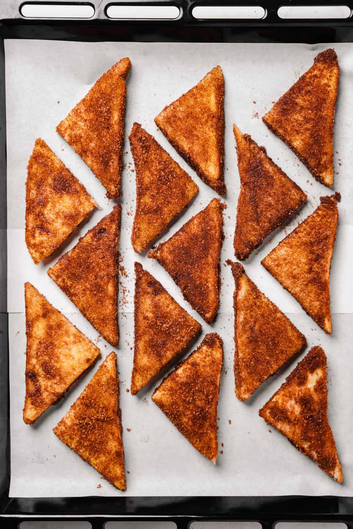 Cinnamon toast cookies on a baking sheet ready to go in the oven.