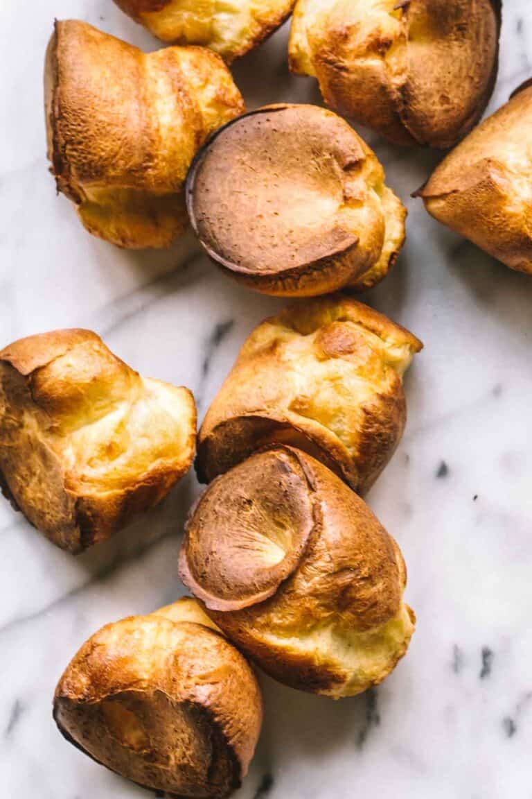 Deeply browned and puffed up muffin tin popovers.