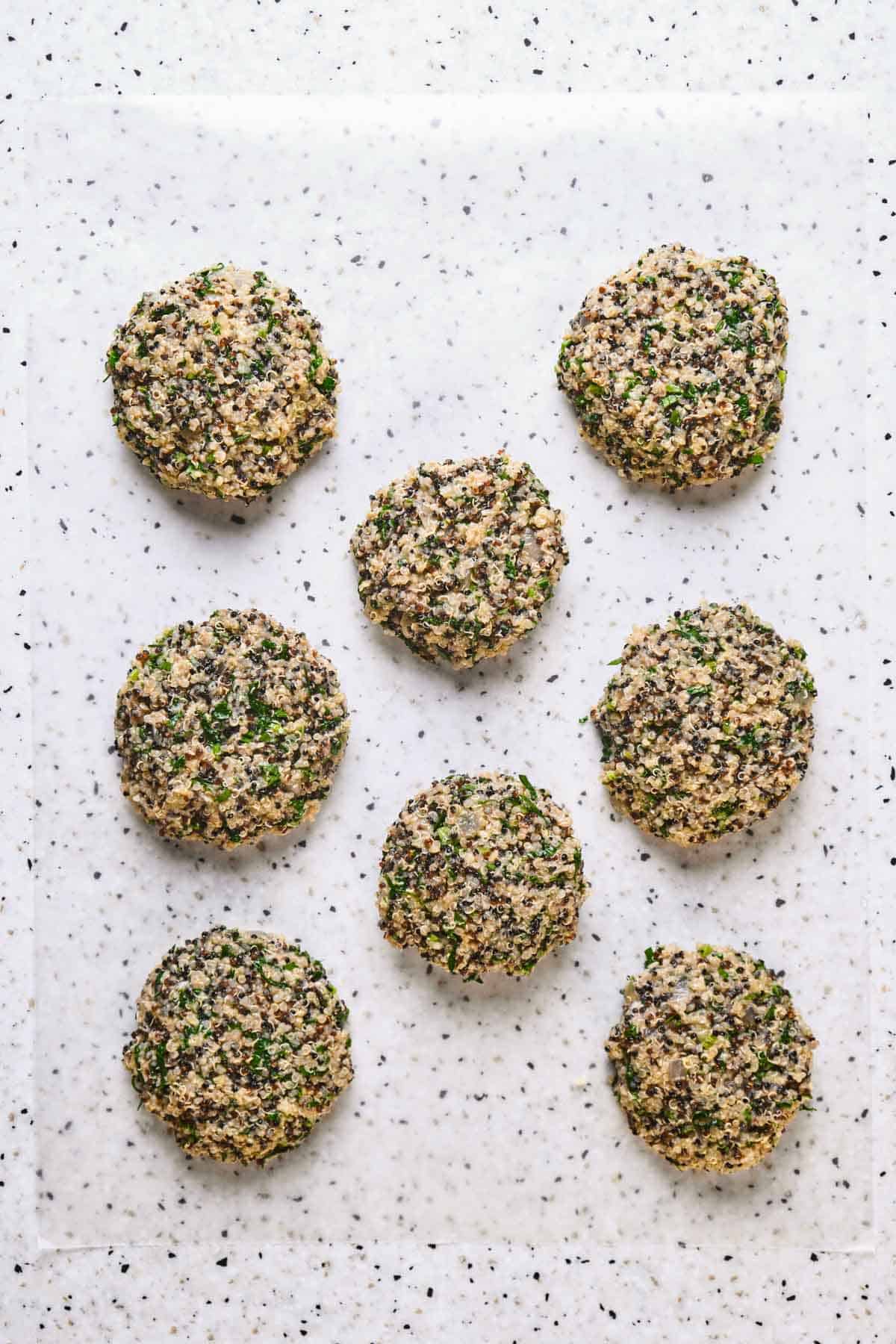 Quinoa mixture formed into 8 patties.