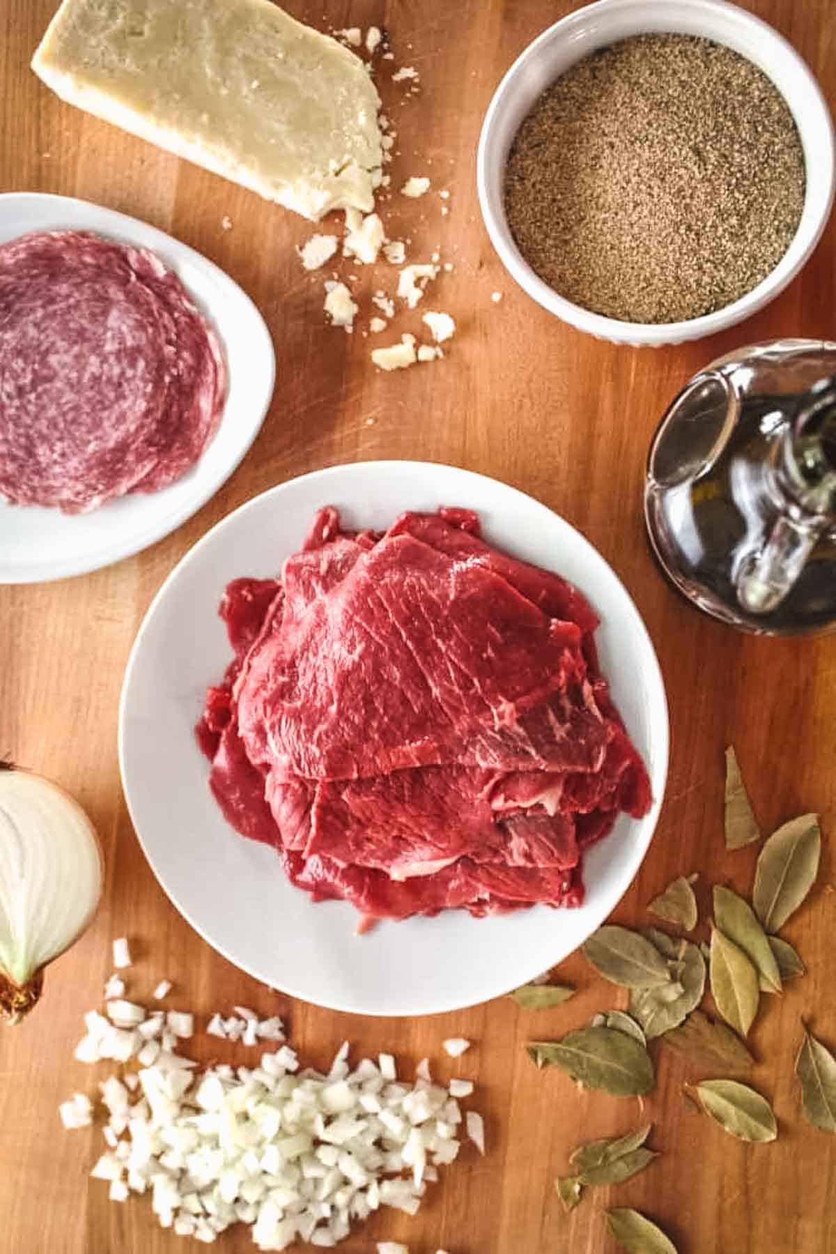 Ingredients laid out for making Sicilian spiedini.