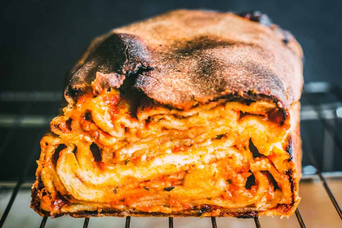 The layers of sauce and cheese inside the lasagna bread.