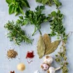 Assorted herbs and spices used in Italian cooking.