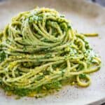 A plate of pasta with pistachio pesto.