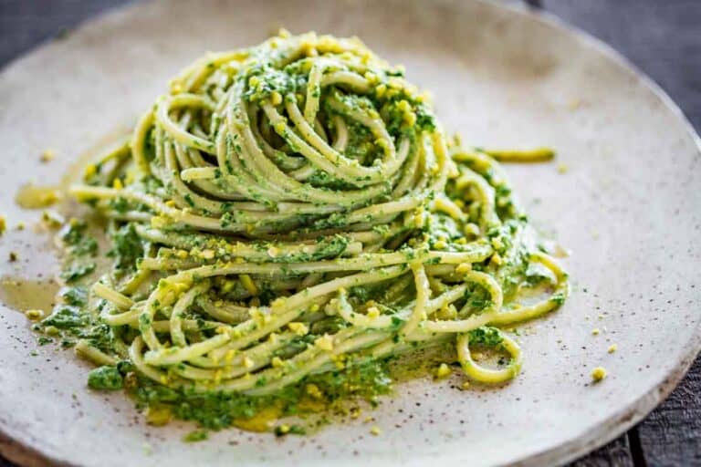 A plate of pasta with pistachio pesto.