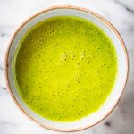 A bowl of freshly made Sicilian lemon garlic herb sauce.
