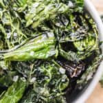 A close up of bright green kale with sea salt.