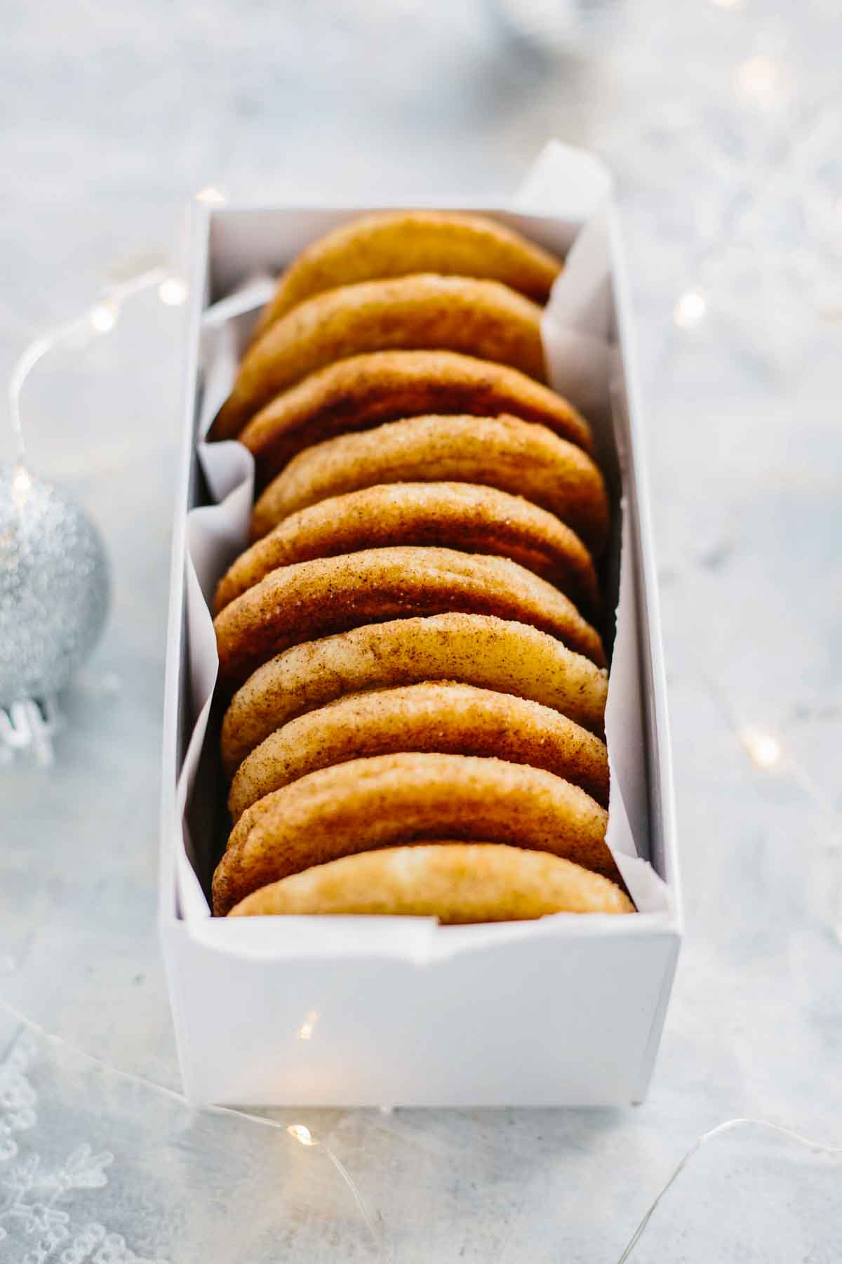 Side view of chai snickerdoodles arranged in a box, ready to serve or share.